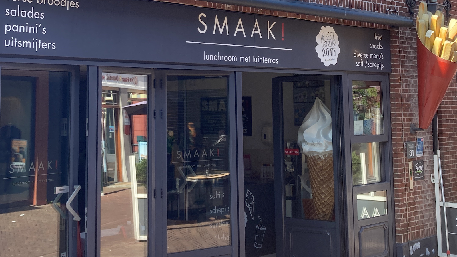 Foto van Smaak Lunchroom met tuinterras